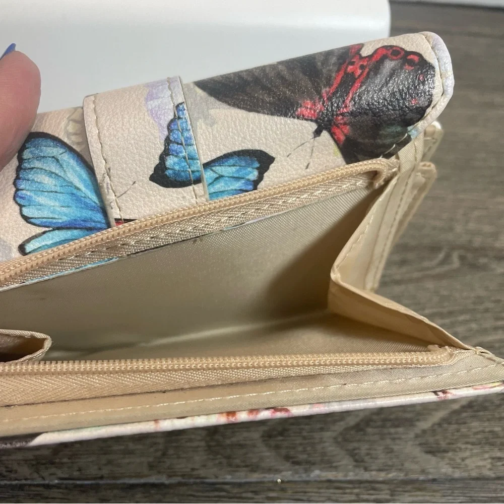 Butterfly Print Women's wallet. ID safe keeper. Pre-owned. Ink marks inside.